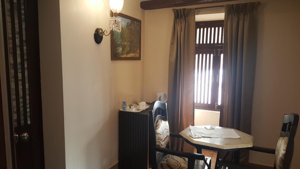 Casa Menezes - A Heritage Goan Homestay Бамболим Стая снимка